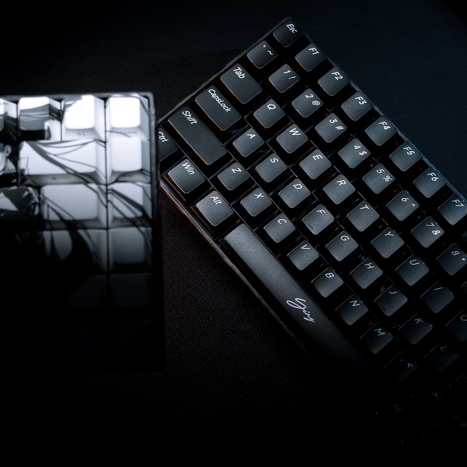 YING75 Forged Carbon Fiber Keyboard next to WLMOUSE, showcasing sleek design and modern aesthetics.