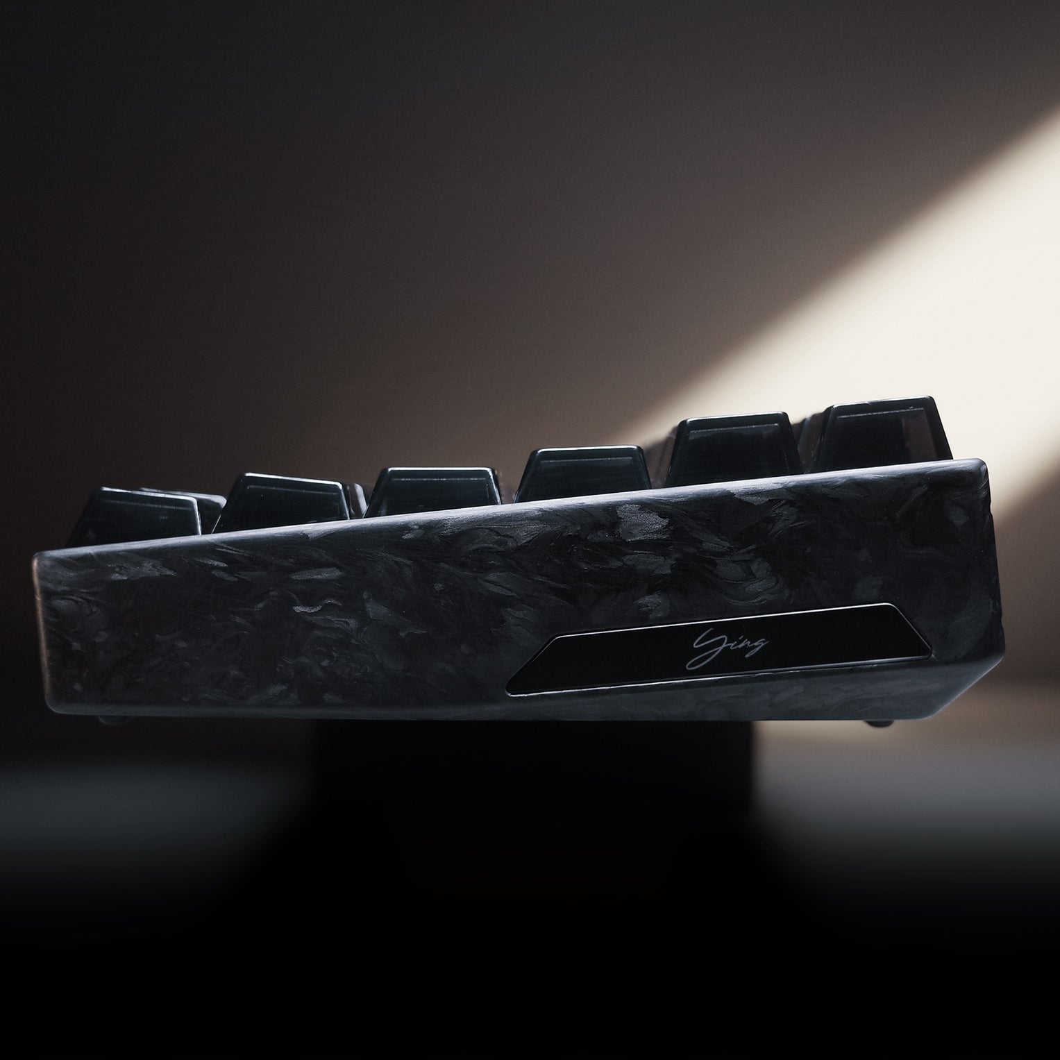 YING75 Forged Carbon Fiber Keyboard with sleek design, showcasing quality craftsmanship and modern aesthetics.